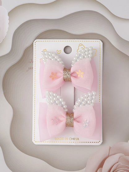 2pcs Toddler Girls Faux Pearl & Bow Decor Hair Clip