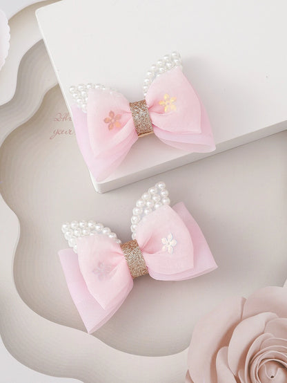 2pcs Toddler Girls Faux Pearl & Bow Decor Hair Clip