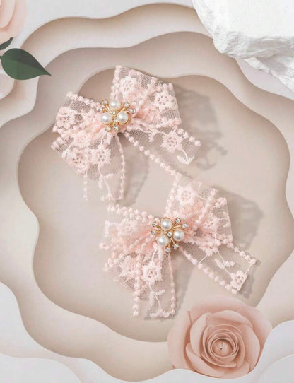 Peach embellished net hair bows