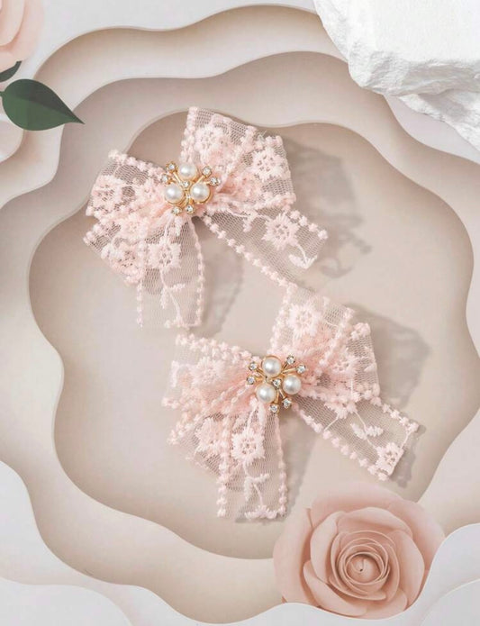 Peach embellished net hair bows