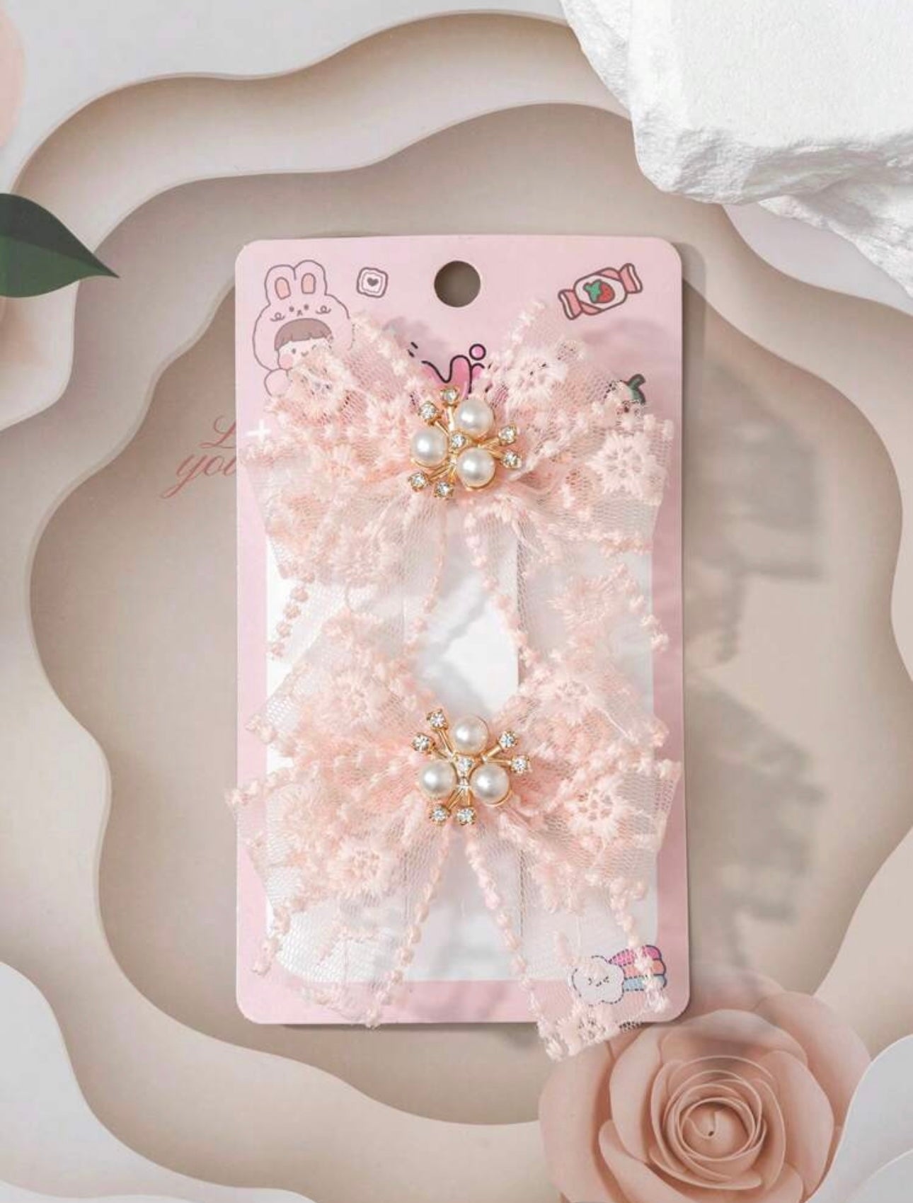 Peach embellished net hair bows